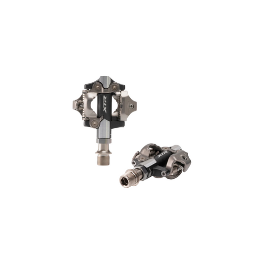 Shimano XTR Pedals | Complete Cyclist - A pedal designed to help you go as fast as you possibly can. The PD-M9100’s low platform height and wide bearing placement create a stiff and stable pedal for optimal pedaling efficiency and power transfer.